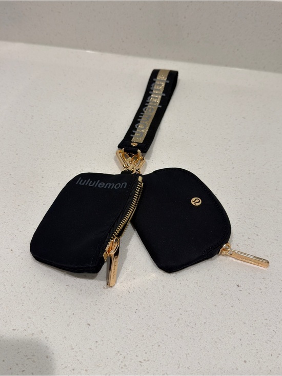 lululemon athletica Handbags - lululemon black double pouch wristlet with gold hardware
